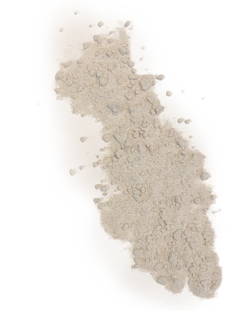 Spilled ingredients of renew and revive soak resembling a sandy beach